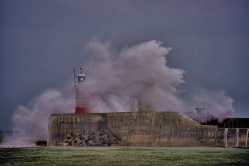Waves Crashing Over the Lighthouse at Newhaven in Sussex