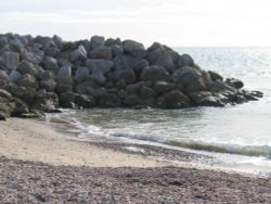 Rocks on Weymouth Beach Wallpaper