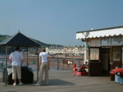 The pier showing the beach Wallpaper