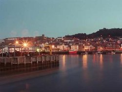 Scarborough Harbour at night Wallpaper