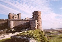 View of the main castle structure from a castle wall. Wallpaper