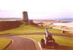 View of the castle outer yard and the coast line. Wallpaper