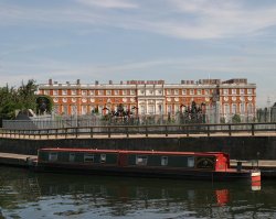 Hampton court bridge and mitre inn hotel from the thames Wallpaper