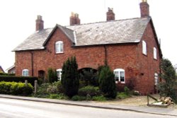 Cottages near site of railway. Pinchbeck, Lincolnshire Wallpaper