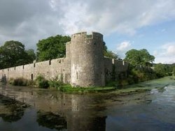 Reflection of the Bishop's Palace in the moat. Wells, Somerset