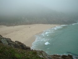 Misty day at Porthcurno, Cornwall Wallpaper