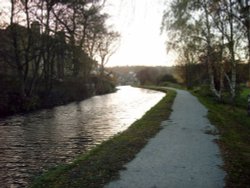 The village of Rodley can be seen in the distance as the Leeds and Liverpool canal approaches Wallpaper