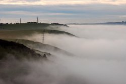Fog rolls over the South Downs on the Fulking Escarpment, West Sussex Wallpaper