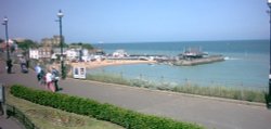 Another view of Broadstairs Harbour with a very large container ship in the distance. 08/06/05 Wallpaper