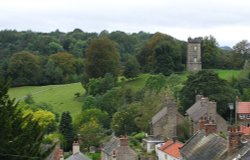 Overlooking roof tops to a distant folly, Richmond, North Yorkshire