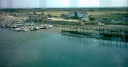 Littlehampton yacht club on the river Arun. Viewed from the top of the Look and sea centre tower. Wallpaper