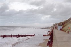 Mundesley, (pronounced Munnsley ) Norfolk, on a blustery summer's evening Wallpaper