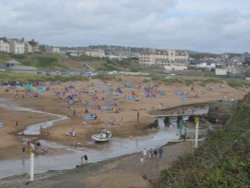 Busy Summerleaze beach at Bude Wallpaper