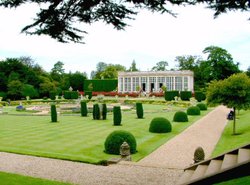 The Orangery, Belton House, Belton, Lincolnshire. The Orangery seen from across the formal gardens. Wallpaper