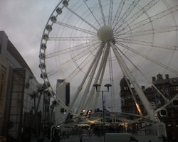 The Manchester Wheel in front of Selfridges. Wallpaper