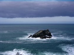 Rock in the sea at Newquay, Cornwall Wallpaper