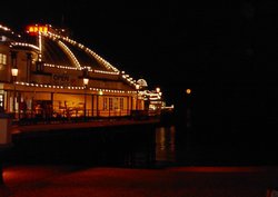 Eastbourne, E. Sussex, the pier by the harvest moon Wallpaper