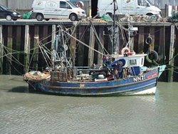 Fishing boat in the harbour. Whitstable, Kent Wallpaper