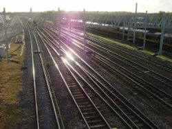 Looking west on the West Coast Mainline railway west of Rugby train station. Wallpaper