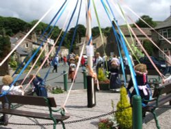 The scarecrow festival held annually at Kettlewell, North Yorkshire Wallpaper