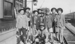 1st Castle Cary Boy Scout Troop on Cary Station on way to camp circa 1950. Castle Cary in Somerset Wallpaper