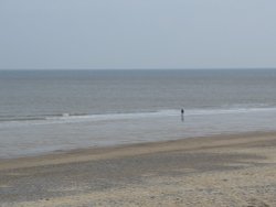 Lone figure, Cromer Beach, Norfolk Wallpaper