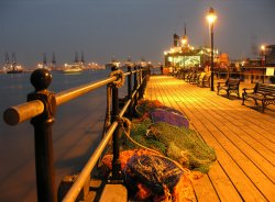 Harwich's historic Ha'penny Pier at night, Looking towards Felixstowe Docks. Essex