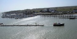 Moving pontoons to allow for dredging on the river Arun Littlehampton. Wallpaper