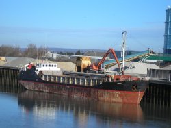 Bulk ore carrier 'Antic' on the river Arun, Littlehampton. Wallpaper