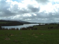 View down one of Rivington's reservoirs with the pike in the distance. Rivington, Lancashire Wallpaper