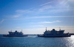 Isle Of Wight ferries passing on the seafront.

Taken:  5th May 2006 Wallpaper