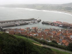 Scarborough, North Yorkshire. Old Harbour in mist from castle Wallpaper