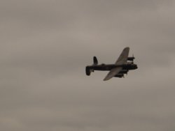 The Lancaster Bomber flys over, Yorkshire Air Museum, Elvington, North Yorkshire. Wallpaper