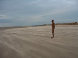 One of the Anthony Gormley figures at Crosby, Merseyside