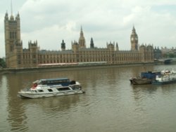 Big Ben and Houses of Parliament looking from south side of Thames, Greater London Wallpaper