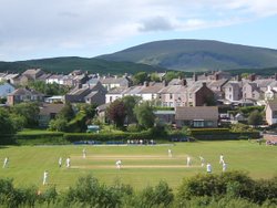 Millom cricket ground, match in progress. Wallpaper