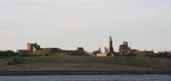 A view of TYNEMOUTH PRIORY & COLLINGWOODS MONUMENT as seen from SOUTH SHIELDS Wallpaper