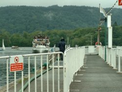 One of the ferrys comming into the harbour at Bowness Wallpaper