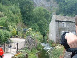 Looking towards Peak Cavern from the river at Castleton Wallpaper