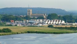 Christchurch Priory, looking from Hengistbury Head, Dorset Wallpaper