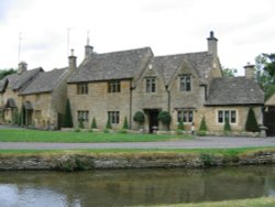 Upper Slaughter in the Gloucestershire Cotswolds. Home alongside the river. Wallpaper