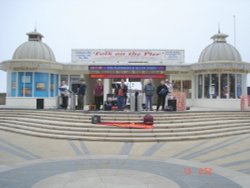 Folk at the Pier Wallpaper