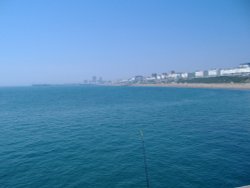 view from Brighton Marina wall looking back towards the pier. Wallpaper