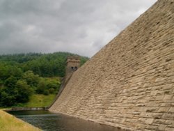 Wide angle picture of the Derwent Reservoir dam from near the bottom Wallpaper