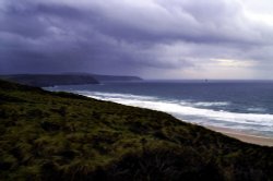 Perran Bay from cliffs just before a storm. Sept 2005 Wallpaper