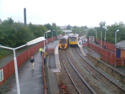 Two passing trains at Accrington staition Wallpaper