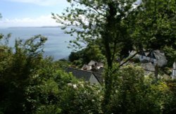 Clovelly, Looking down on the rooftops from the path leading down to the village. Devon, July 2006 Wallpaper