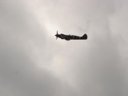 A WW2 Event,a Spitfire Flypast at Embsay and Bolton Abbey Steam Railway, North Yorkshire. Wallpaper