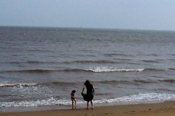 Getting wet in the sea Cleethorpes, Lincolnshire Wallpaper