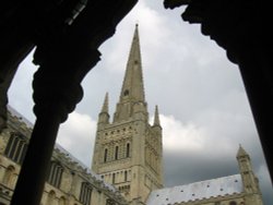 Norwich, Norfolk. View of spire of Cathedral from cloisters Wallpaper